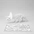 Dinosaur skeleton model on a table with a completed puzzle below